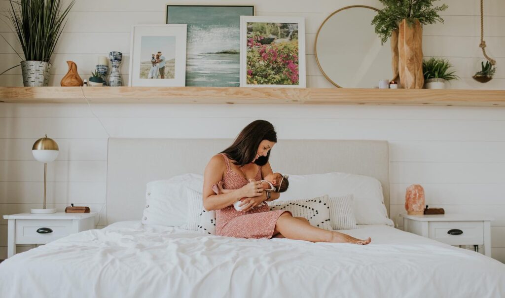 mother and newborn in a beautiful bedroom