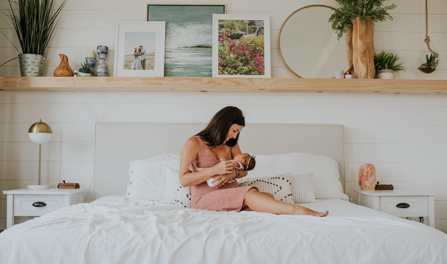 mother and newborn in a beautiful bedroom