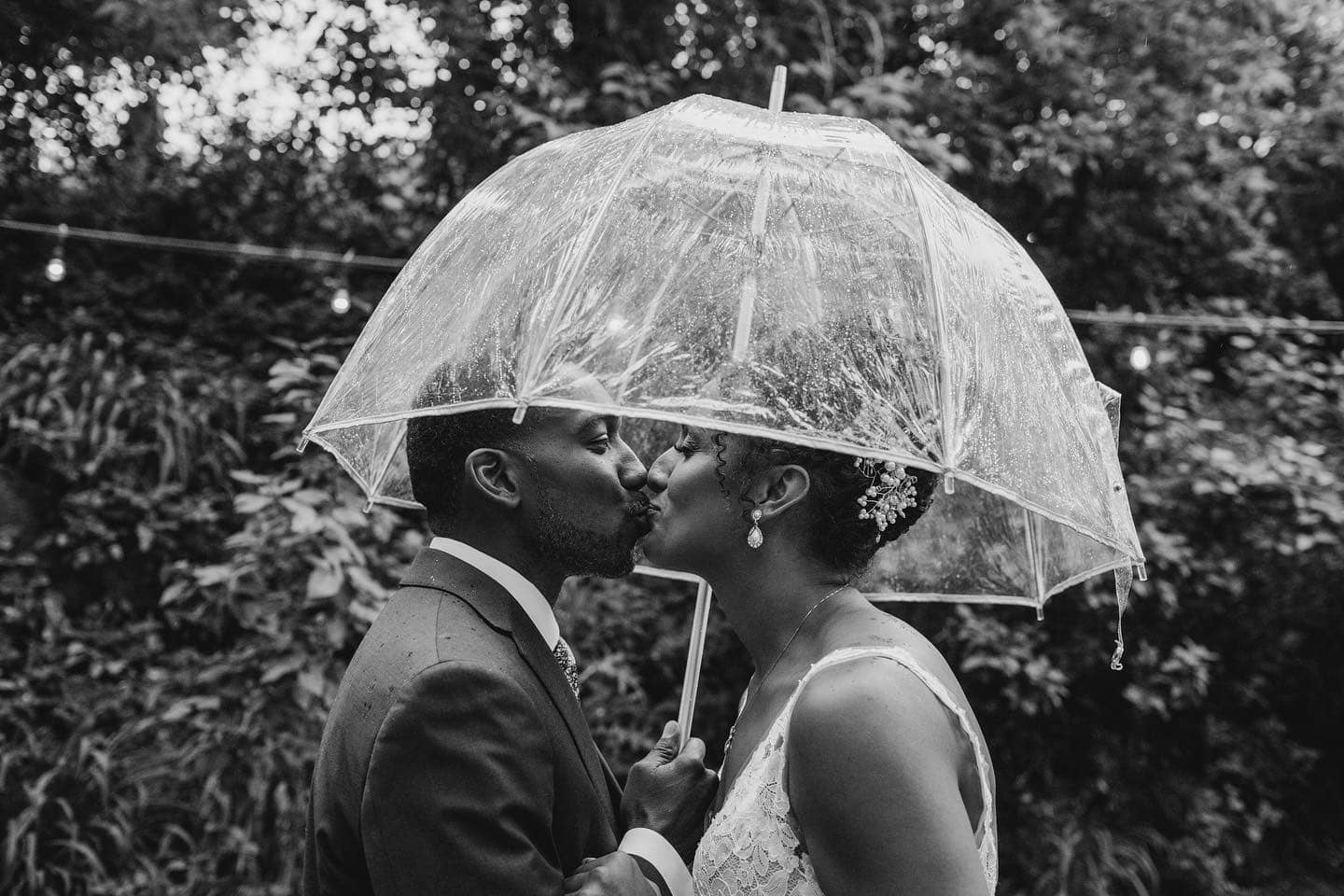 black couple under umbrella