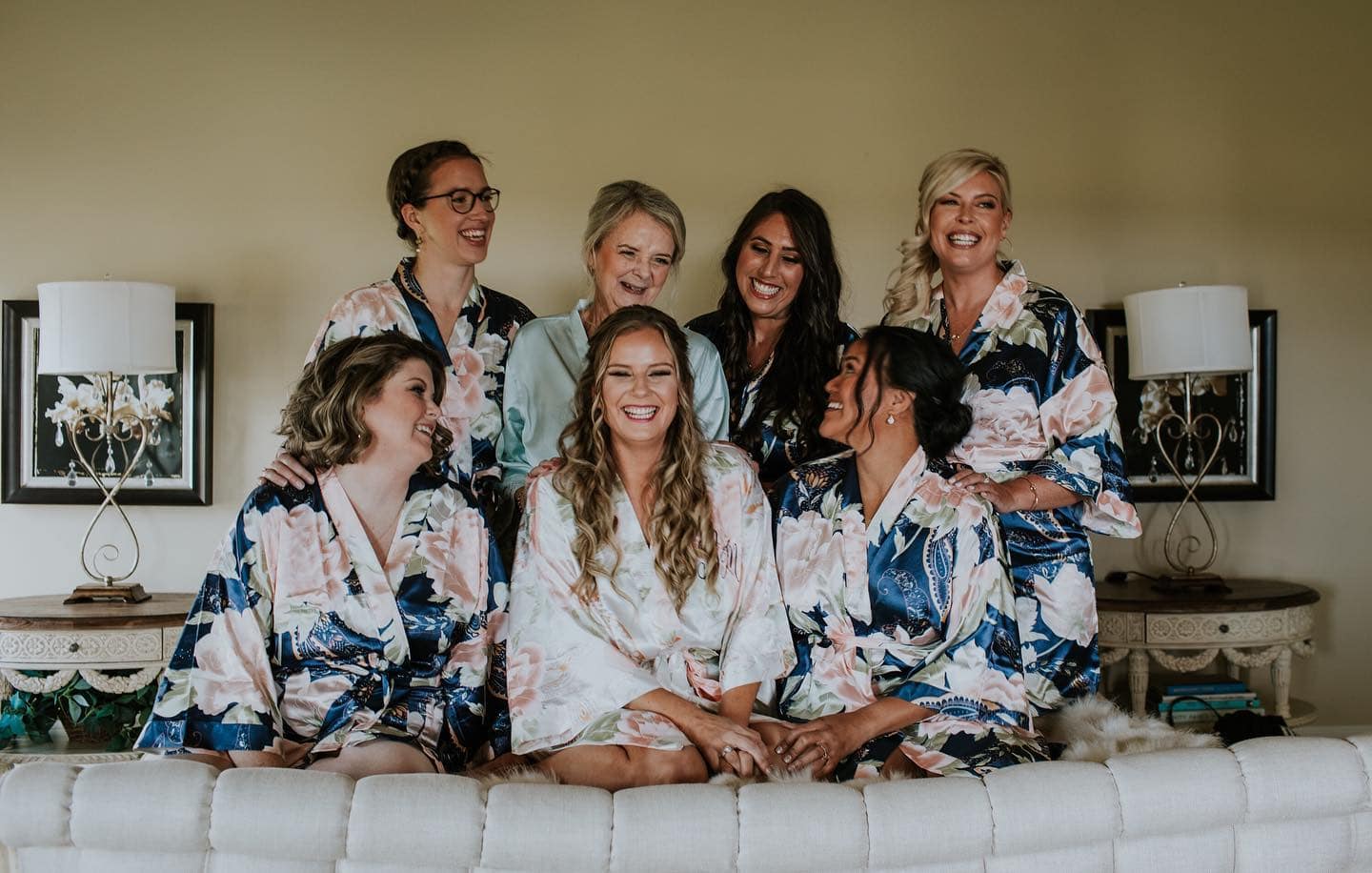 Bride ad bridesmaids in flower robes